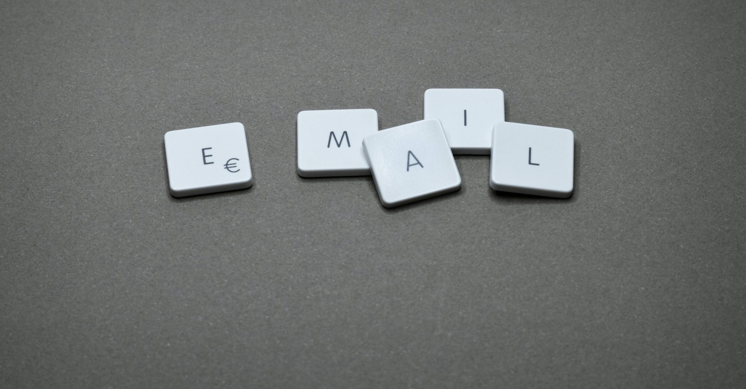 White tiles spelling "email"